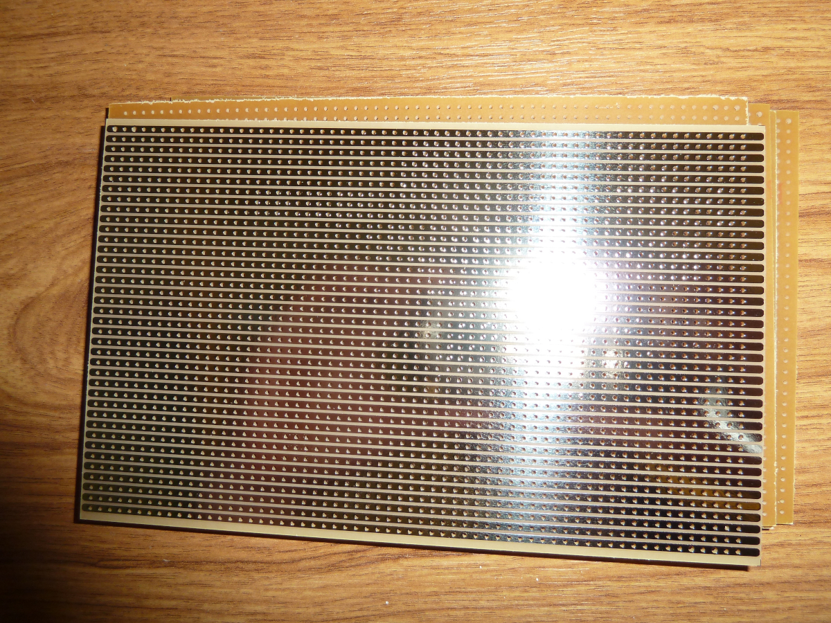 Photo of stripboard, solder side