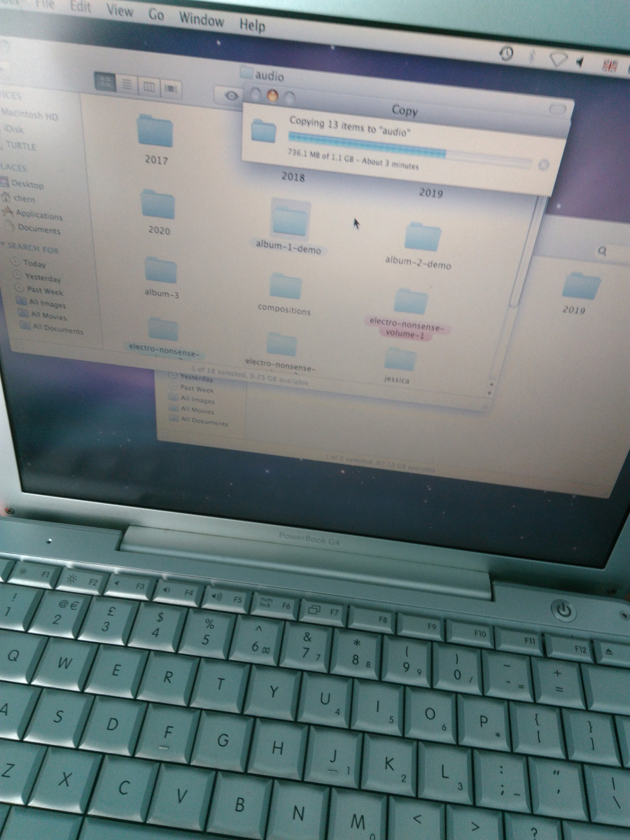 Photo of the process of backing up the PowerBook, and the progress of the file transfers