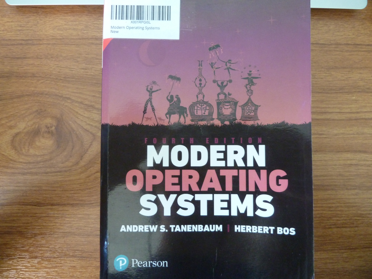 Photo of the book Modern Operating Systems 4th Edition by Andrew S. Tanenbaum and Herbert Bos