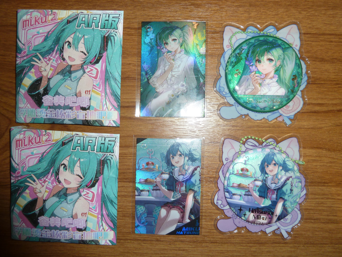 Photo of badges/cards from Hong Kong 2026 1