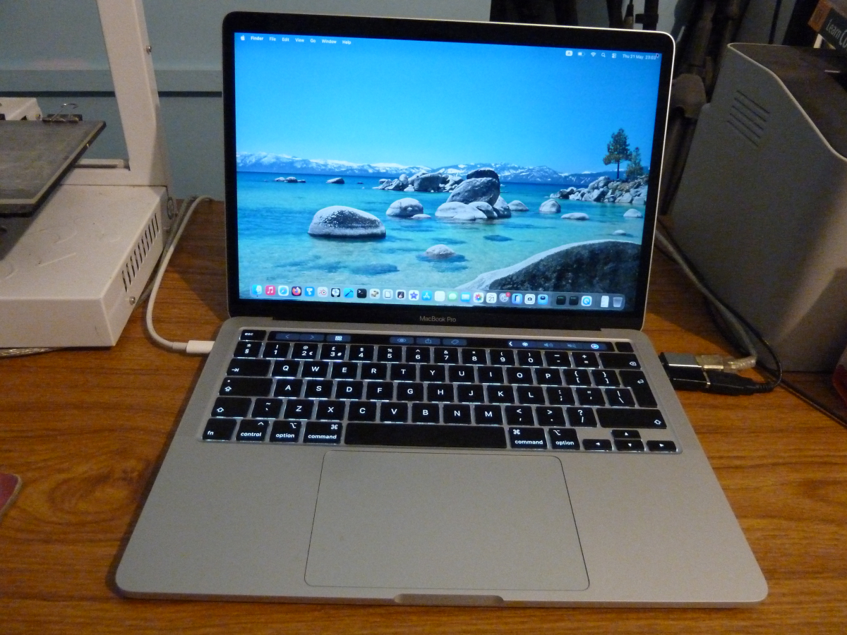 Photo of macOS Tahoe (26.5) installed on a MacBook Pro 13 inch, 2020, four Thunderbolt 3 ports